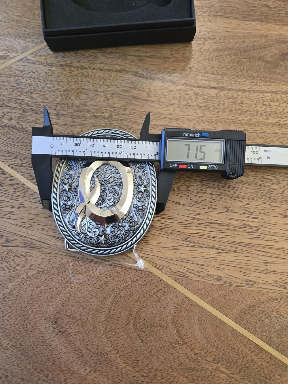 Silver and Black 'Q' Decorative Belt Buckle